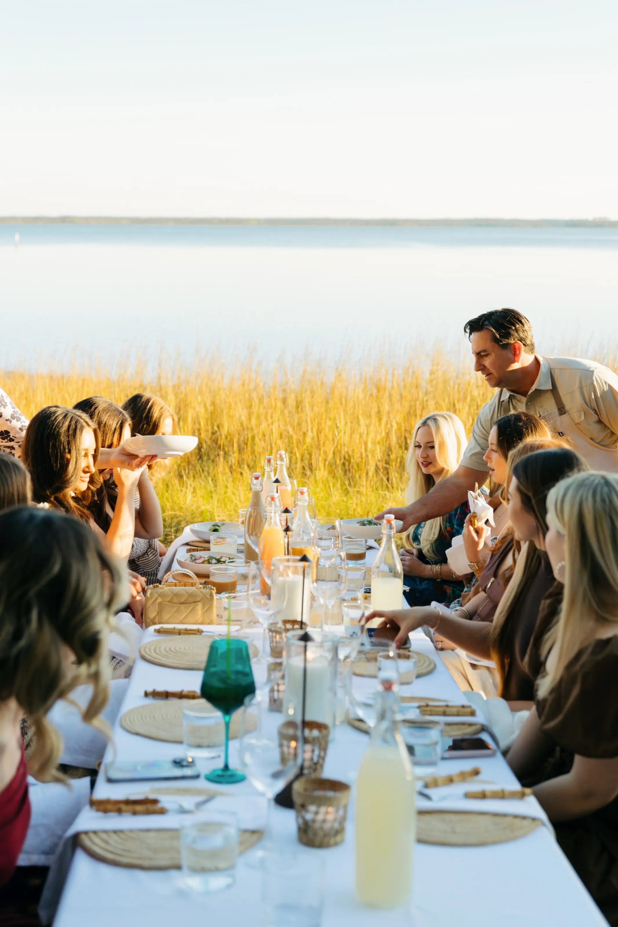 Guests seated together at the long table.