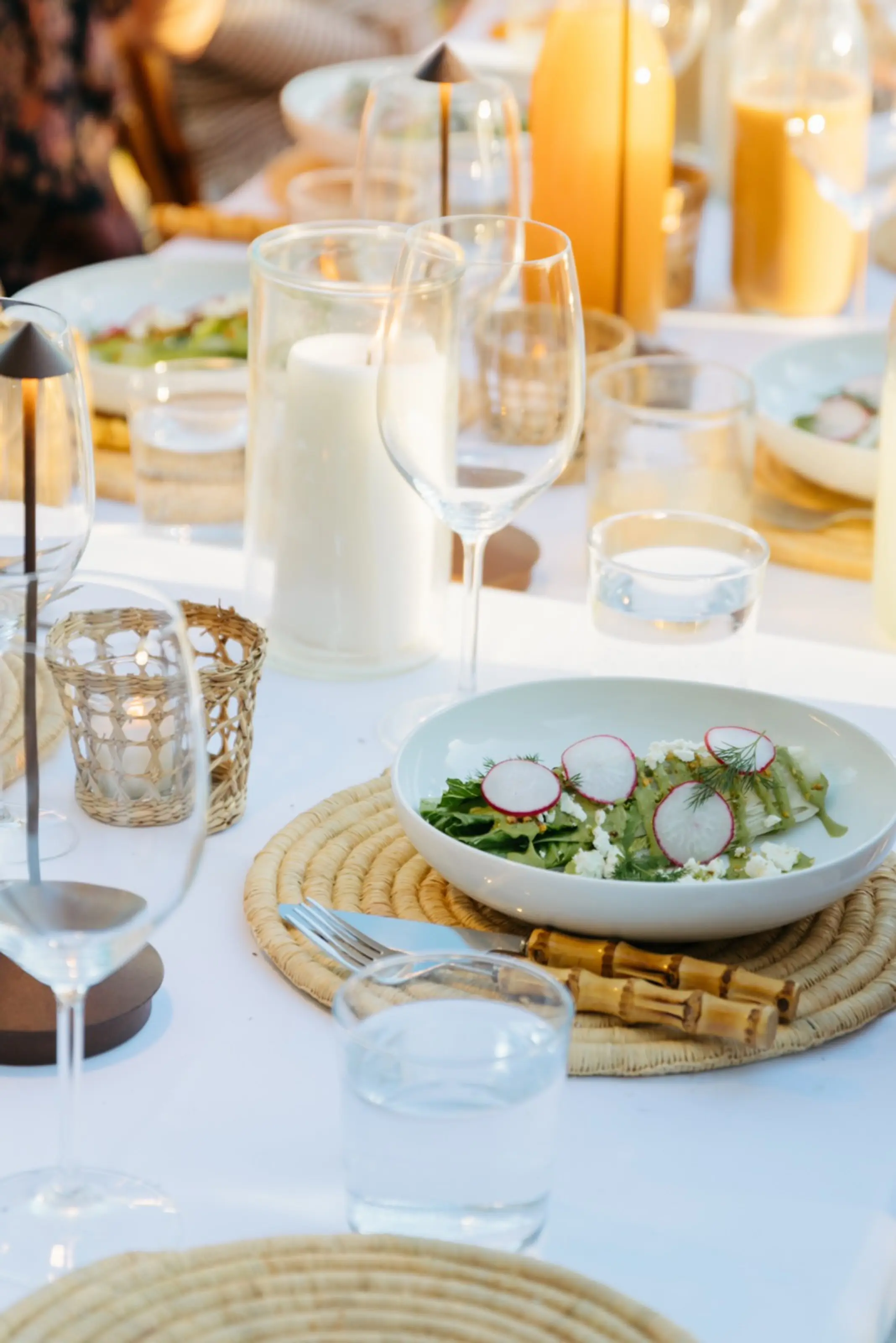 A salad course on the table.